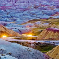 Headlights streaking through Badlands National Park, South Dakota