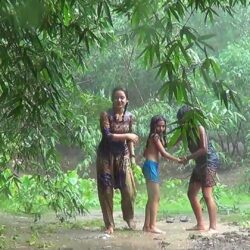 Villege girl bath rain Bangladesh []