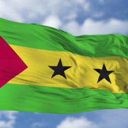Sao Tome and Principe Flag in a Blue Sky. Use this clip loud and