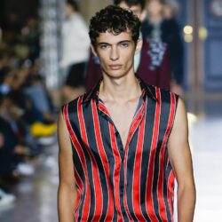 Male model, Piero Mendez, walking the catwalk at Givenchy SS18 m