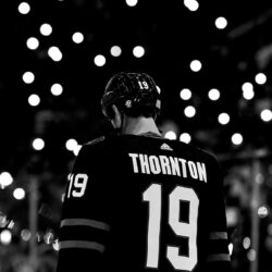 Joe Thornton of the San Jose Sharks stands for a moment of