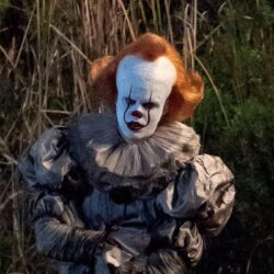 New Photos Show Bill Skarsgård as Pennywise on the Set of “It