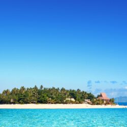 Clear sky over a resort on a Fiji island wallpapers