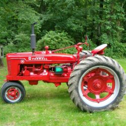 red and black farmall tractor free image