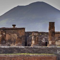 The Temple of Jupiter and Mount Vesuvius from Pompeii, Italy