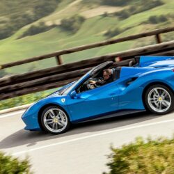 Blue Ferrari 488 Spider on the road wallpapers
