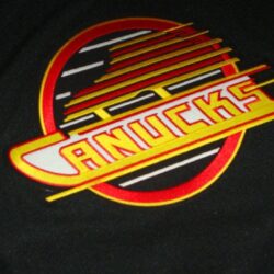 Vintage hockey NHL crest jersey skates Vancouver Canucks wallpapers