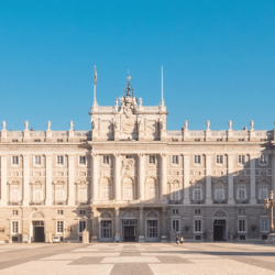 royal palace of madrid timelapse zoom out blue sky sun lighting the