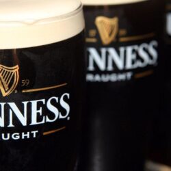 Download Three Full Guinness Draught Glasses Wallpapers