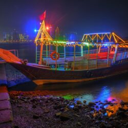 Colorful Illuminated Dhow Boat At Night