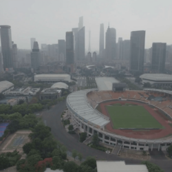 Panning aerial view of the stadium of the Guangzhou Evergrande