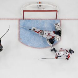 An NHL photographer captured an incredible image of Holtby’s save