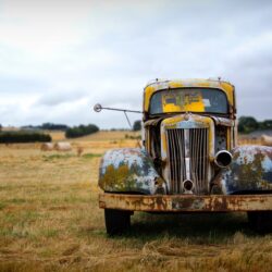a rusted vintage yellow truck on the great ocean roadrusted truck