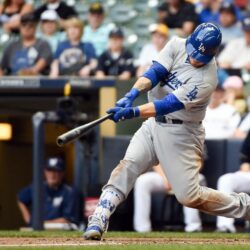 Yasmani Grandal drives home eight, just 11th catcher to do it