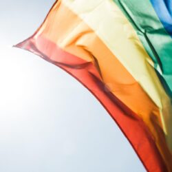rainbow pride flag flying in the daytime breezeproud rainbow flag 4k