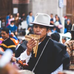 Man Playing Bamboo Wind Instrument · Free Stock Photo