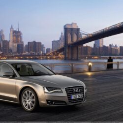 2011 Audi A8 Side Front Pose In Golden Wallpapers