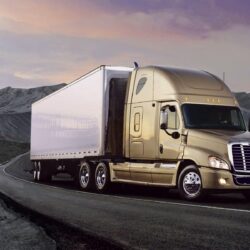 Powerful Freightliner truck on the road