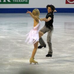 woman and man ice skating free image