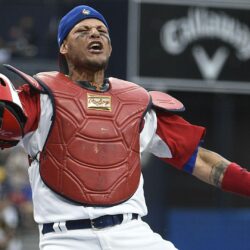 The internet wants to know how a ball got stuck to Yadier Molina’s