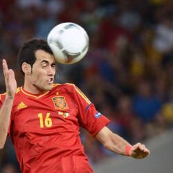 best football player of barcelona sergio busquets strikes with his