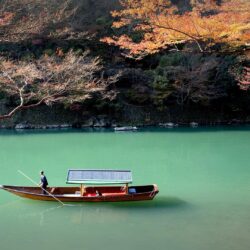 Rowing boat on Katsura river, Arashiyama, Japan