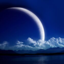 Crescent moon over clouds wallpapers