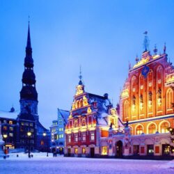 Riga Latvia buildings houses church bell tower square tree tree