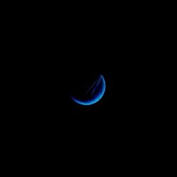 Half a blue moon on a black backgrounds wallpapers and image