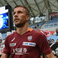 Podolski’s debut double earns Vissel Kobe victory