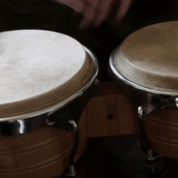 close up playing bongo drums Stock Video Footage