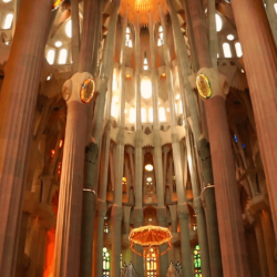 Tilting shot of the interior of the La Sagrada Familia Gaudi church