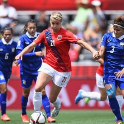 Ada Hegerberg of Norway is challenged by Natthakarn Chinwong of