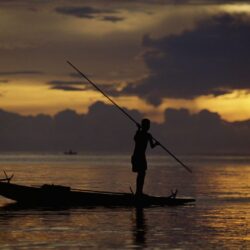 Nature: Fisherman At Sunset, Fergusson’s Island, Papua New Guinea